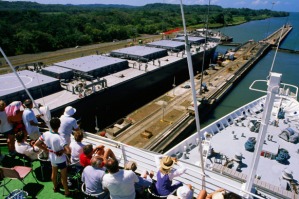 Incredible ... passengers watch as their ship passes through the gates of a lock.