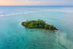 An aerial view of Muri Lagoon at sunrise on Rarotonga in the Cook Islands.