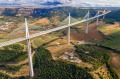 The Millau Viaduct by architect Norman Foster, between Causse du Larzac and Causse de Sauveterre and above Tarn, ...