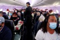 Air New Zealand will temporarily cease serving food on board flights in order to stop passengers removing their masks to eat.