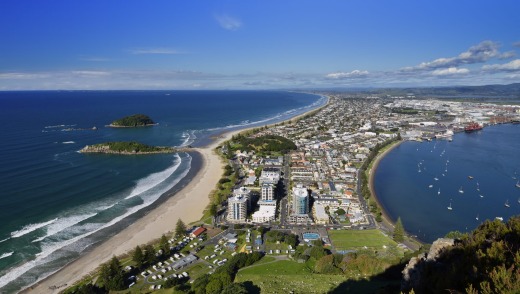 Sail into Tauranga and you're rewarded with leaping dolphins, wild beaches and a volcanic plug that guards the entrance ...